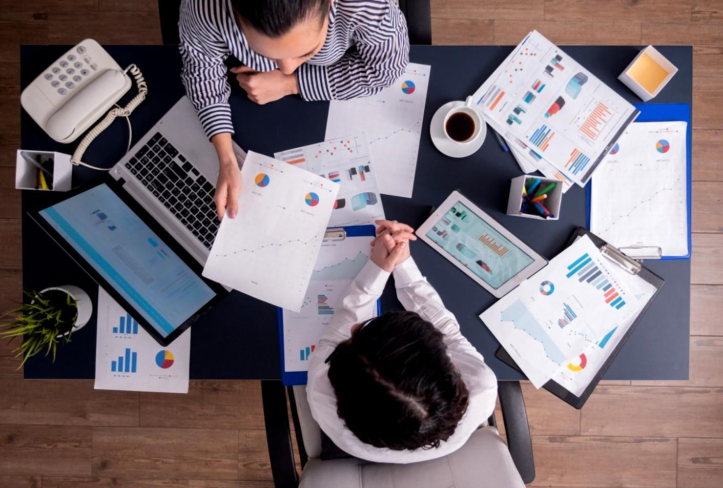 Student reviewing practical exercises and course materials on professional setup